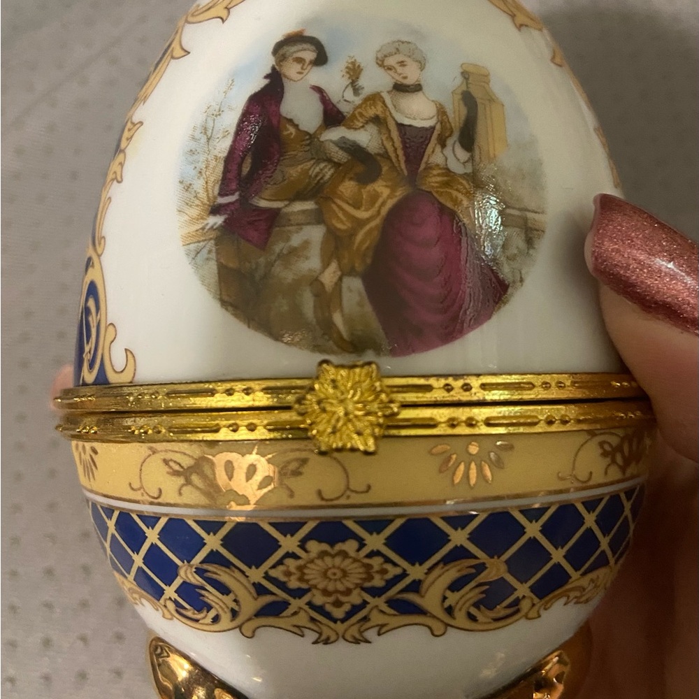 Elegant Decorative Egg with Gold and Blue Accents